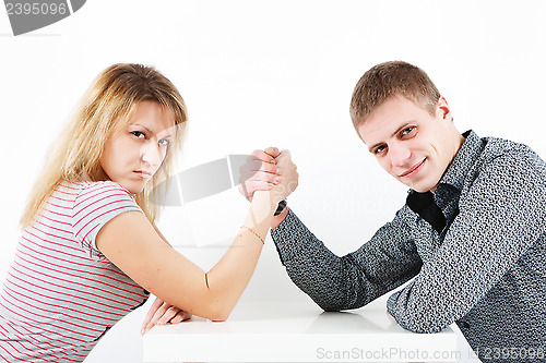 Image of family armwrestling