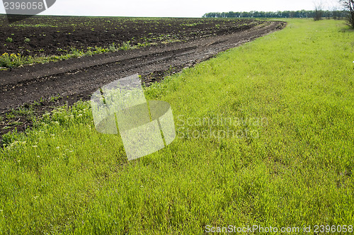 Image of rural road near field