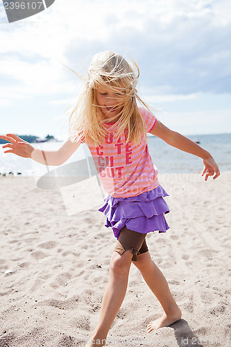 Image of Young girl at beach