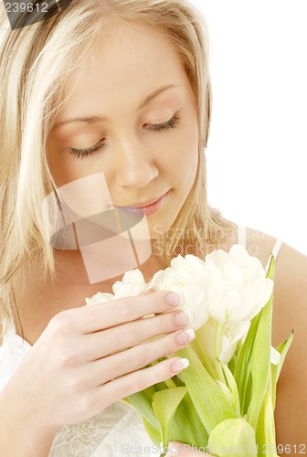 Image of lovely blond with white tulips