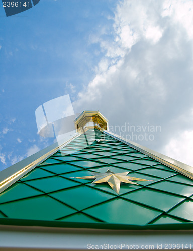 Image of view to spire of orthodox church