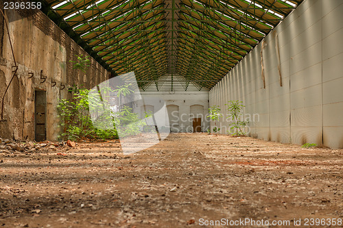 Image of Abandoned industrial interior with bright light