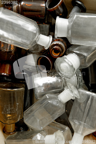 Image of Photo of an old laboratory with a lot of bottles