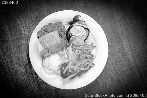 Image of Delicious hamburger on white plate