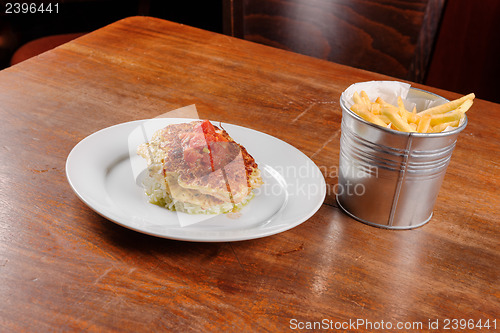 Image of Fried chicken ribs and rice with tomato sauce