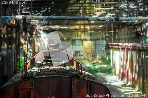 Image of Cargo trains in old train depot