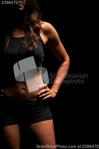 Image of Muscular fitness instructor in a studio
