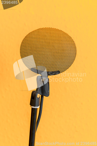 Image of Modern microphone against isolated background