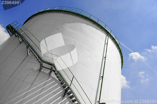 Image of Large industrial silo with blue sky