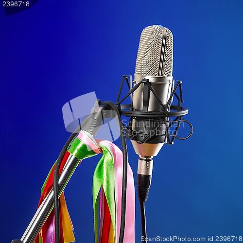 Image of Microphone on blue background