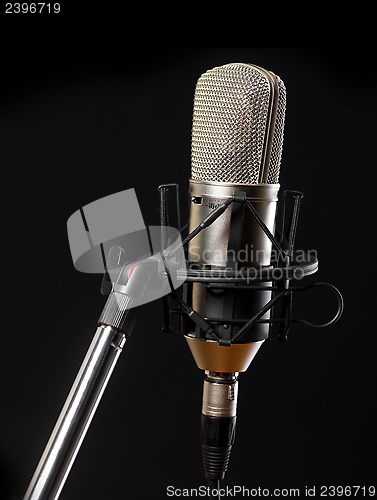 Image of Microphone on black background