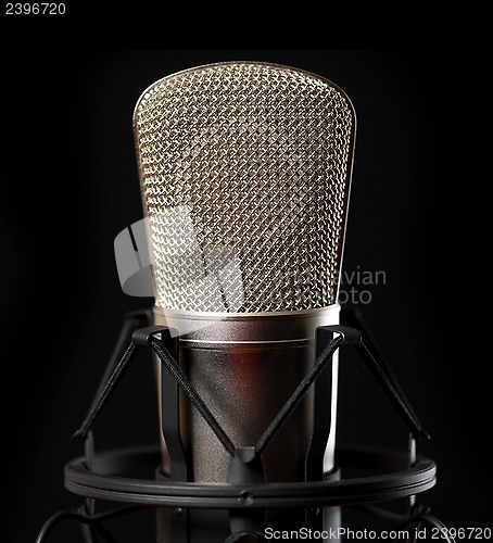 Image of Microphone on black background