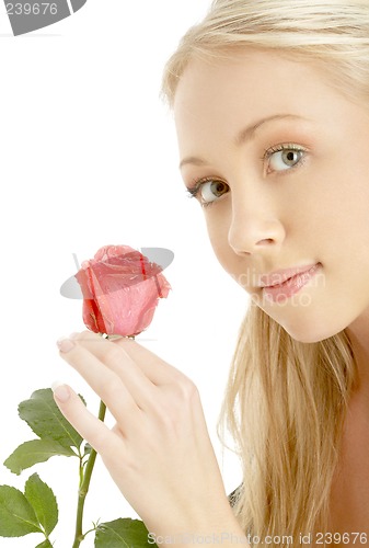 Image of romantic blond with red rose