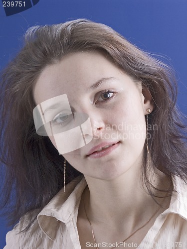 Image of beautiful woman on a blue