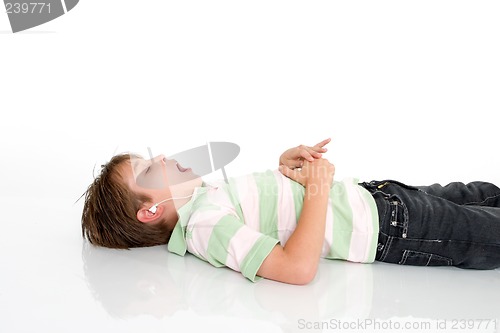 Image of Child listing to music