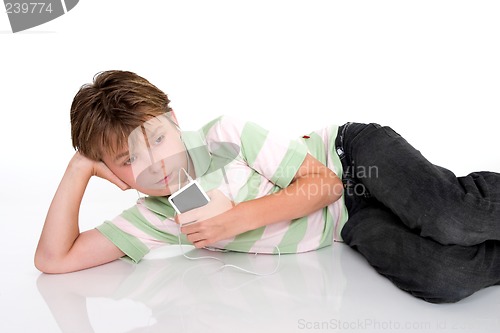 Image of Child with a portable mp3 player