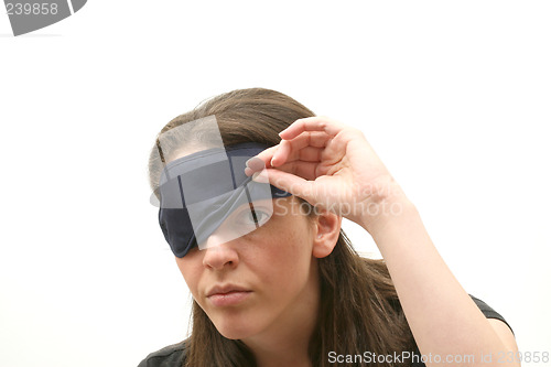 Image of Woman wearing a blindfold