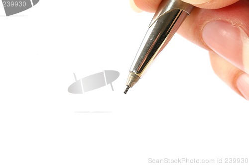 Image of Hand holding a pencil