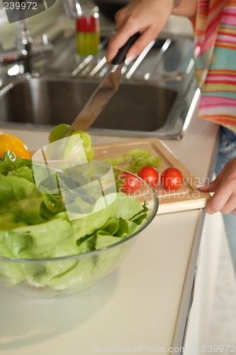 Image of Woman preparing food