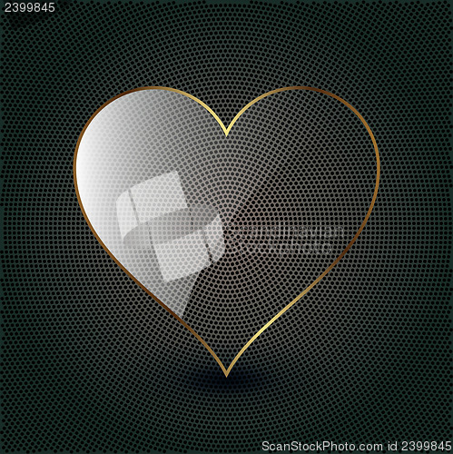 Image of glass heart on a metal background