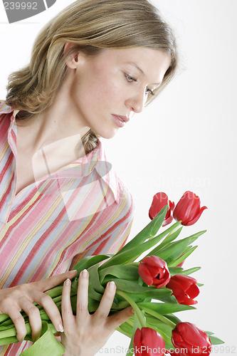 Image of Woman holding flowers
