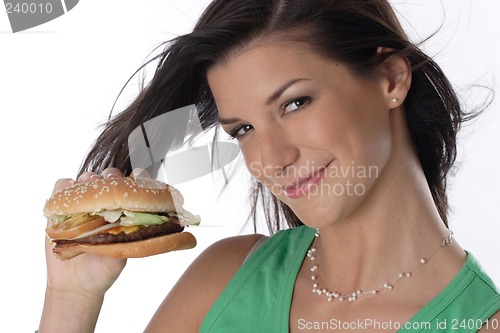 Image of Woman holding burger
