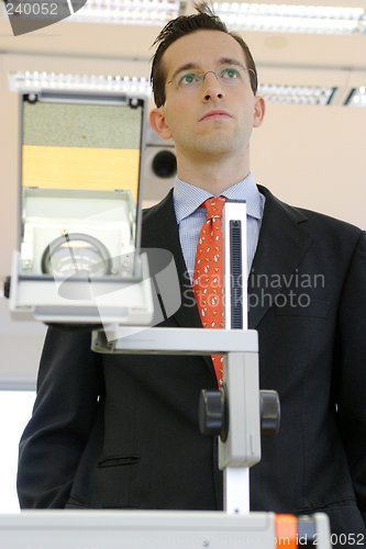 Image of Businessman in boardroom