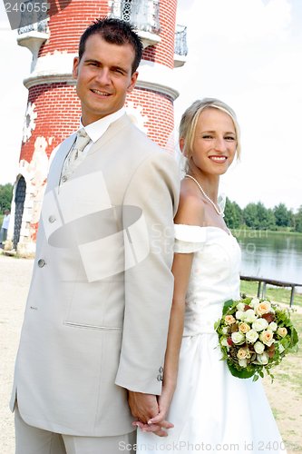 Image of Newlywed couple posing