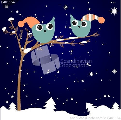 Image of simple card illustration of two funny cartoon owls with christmas hats on a branch