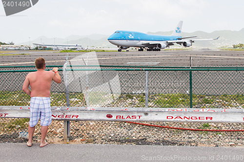 Image of ST MARTIN, ANTILLES - JULY 19, 2013: Boeing 747 aircraft on ther