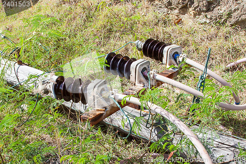 Image of Old electric pole fallen