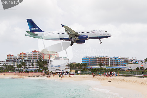 Image of PRINCESS JULIANA AIRPORT, ST MAARTEN - July 19, 2013: Airplane l