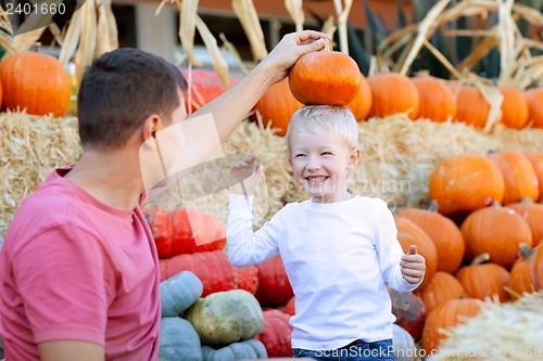 Image of family at pumpkin patch