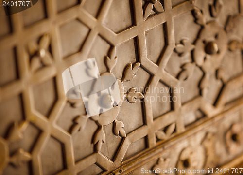 Image of Ornament on an ancient metal door. India
