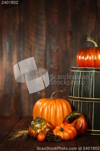 Image of Fall Themed Scene With Pumpkins on Wood 