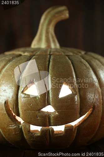 Image of Halloween Pumpkin on Wood Grunge Rustick Background