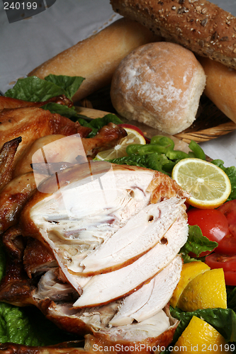 Image of Carved chicken with bread