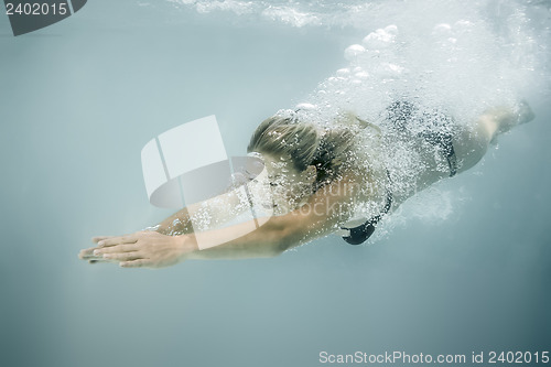 Image of woman diving