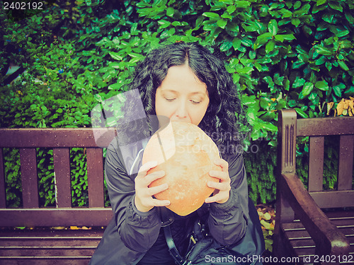 Image of Girl eating bread
