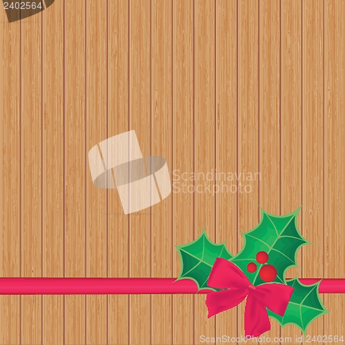 Image of Christmas background with holly berry leaves on dark green background