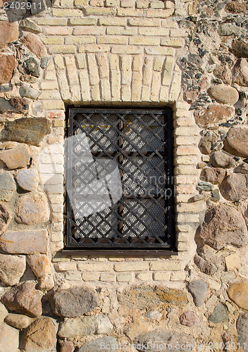 Image of window iron protect bar retro brick stone house 