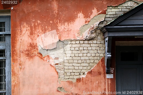 Image of The wall with the damaged paint coating