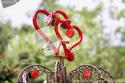 Image of Two red hearts with iron locks