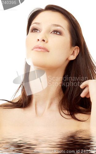 Image of lovely brunette in water looking up