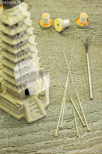 Image of acupuncture needles and moxibustion cones