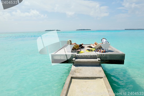 Image of happy young couple have fun on beach