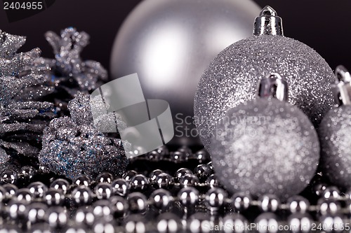 Image of christmas decoration in silver on black