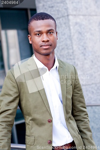 Image of young successful african business man outdoor in summer