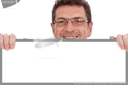 Image of mature smiling businessman holding billboard copyspace isolated
