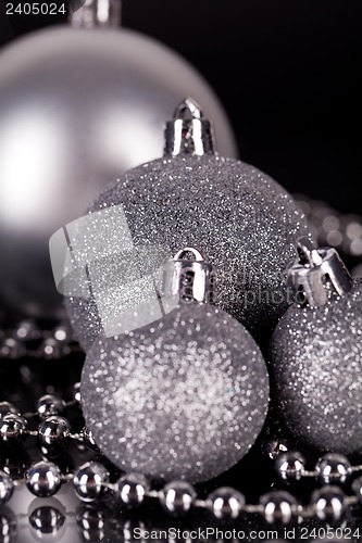 Image of christmas decoration in silver on black